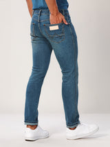 กางเกงยีนส์ผู้ชาย คอลเลคชั่น EVERYDAY WITH WRANGLER VEGAS FIT เอวกลาง ทรงรัดรูป สียีนส์กลาง