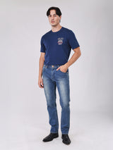กางเกงยีนส์ผู้ชาย คอลเลคชั่น BEYOND DENIM LARSTON FIT เอวต่ำ ทรงเข้ารูป สียีนส์กลาง